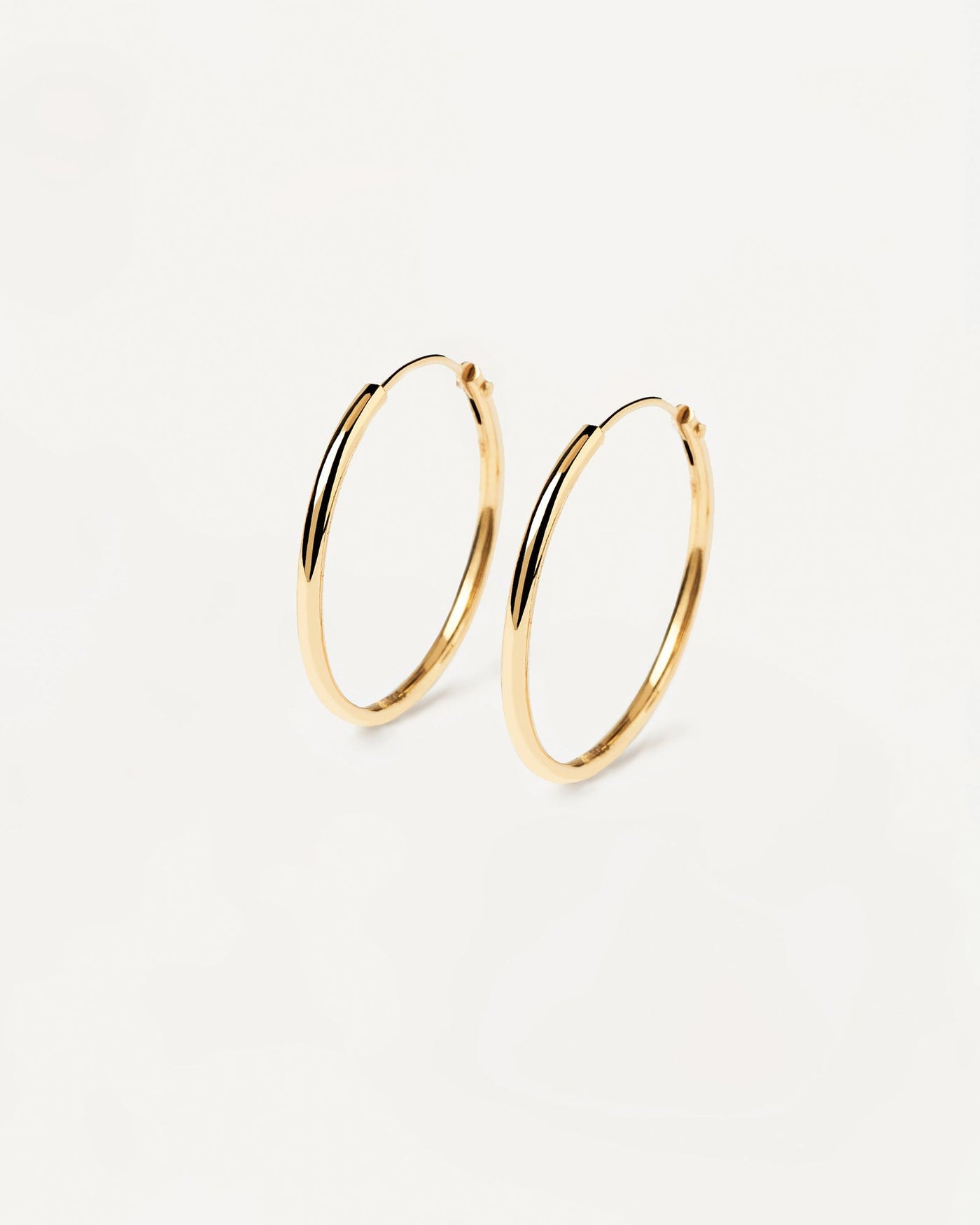 2024 Selection | Medium Hoops. Classic round endless hoop earrings in 18k gold plated silver. Get the latest arrival from PDPAOLA. Place your order safely and get this Best Seller. Free Shipping.