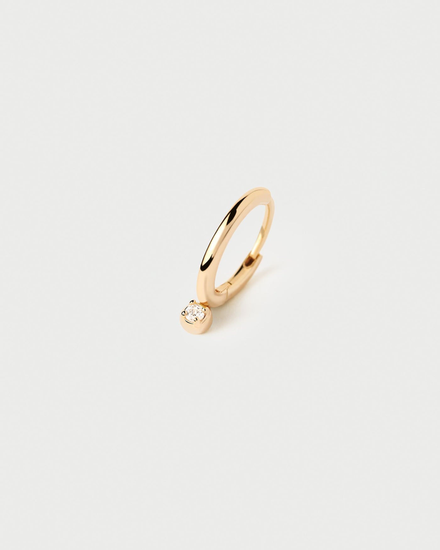 2024 Selection | Tide Single Hoop Earring. Gold-plated silver ear piercing with tiny white zirconia pendant. Get the latest arrival from PDPAOLA. Place your order safely and get this Best Seller. Free Shipping.