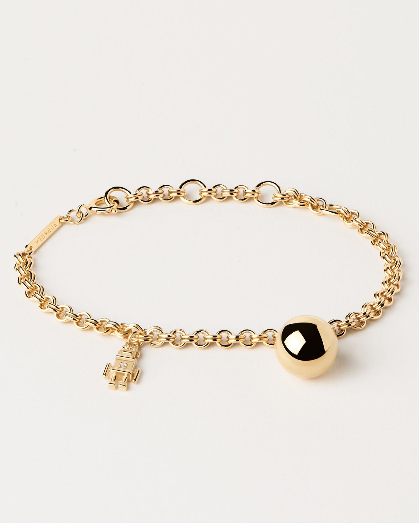 2024 Selection | Space Age Bracelet. Gold-plated silver chain bracelet with robot and ball motives. Get the latest arrival from PDPAOLA. Place your order safely and get this Best Seller. Free Shipping.