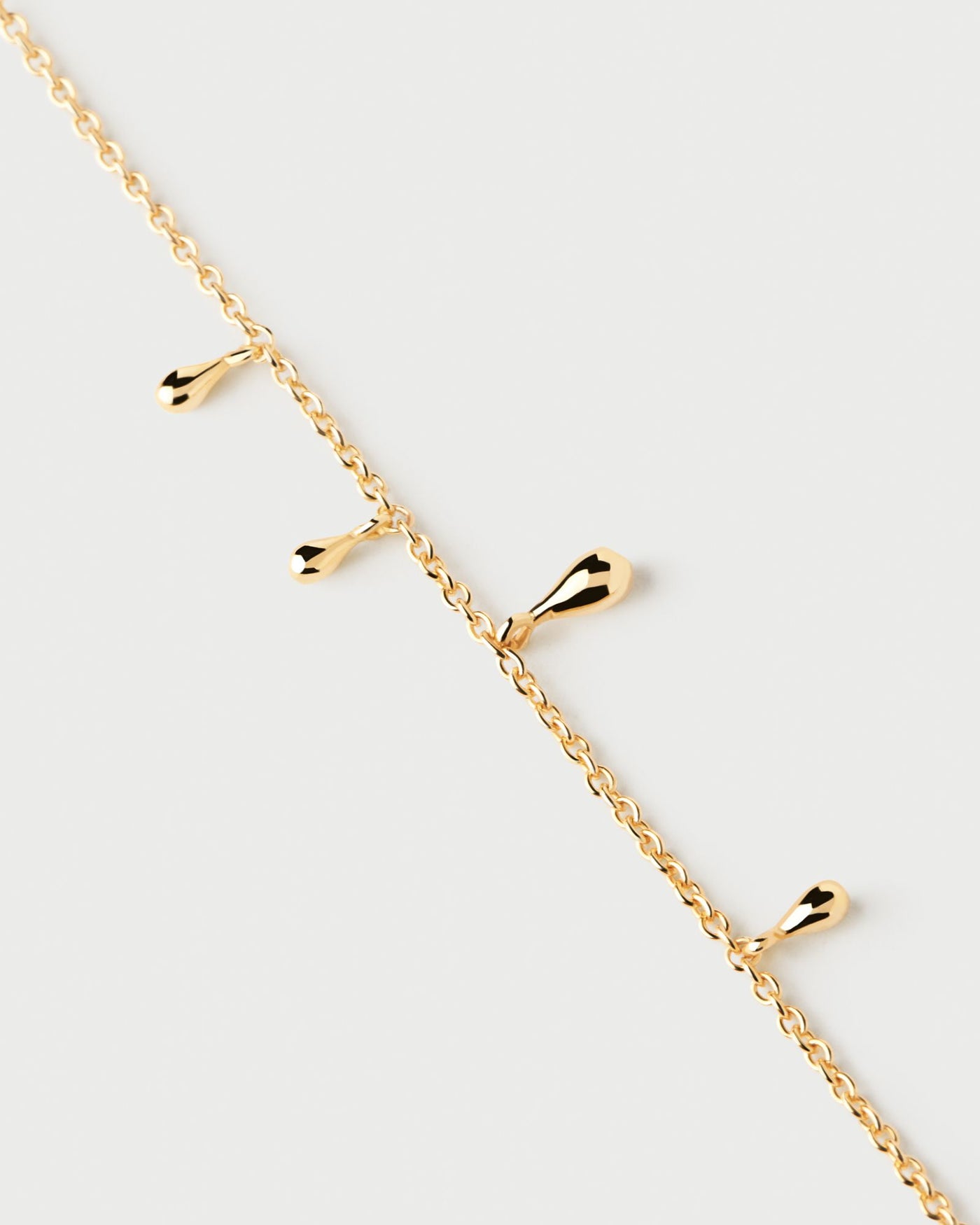 2024 Selection | Teardrop Bracelet. Gold-plated silver bracelet with small drop pendants. Get the latest arrival from PDPAOLA. Place your order safely and get this Best Seller. Free Shipping.