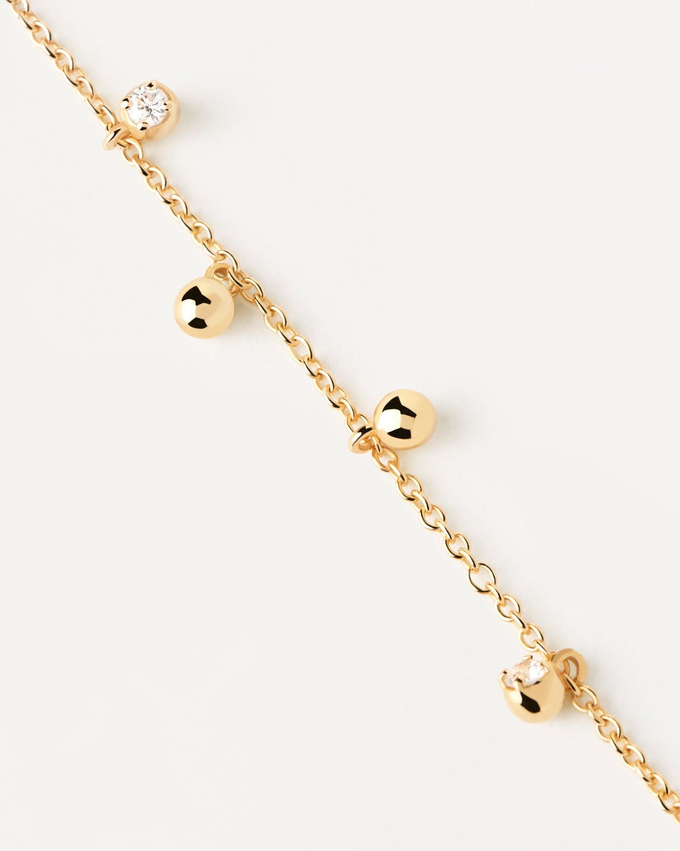 2024 Selection | Bubble Bracelet. Gold-plated silver bracelet with small zirconia and ball pendants. Get the latest arrival from PDPAOLA. Place your order safely and get this Best Seller. Free Shipping.