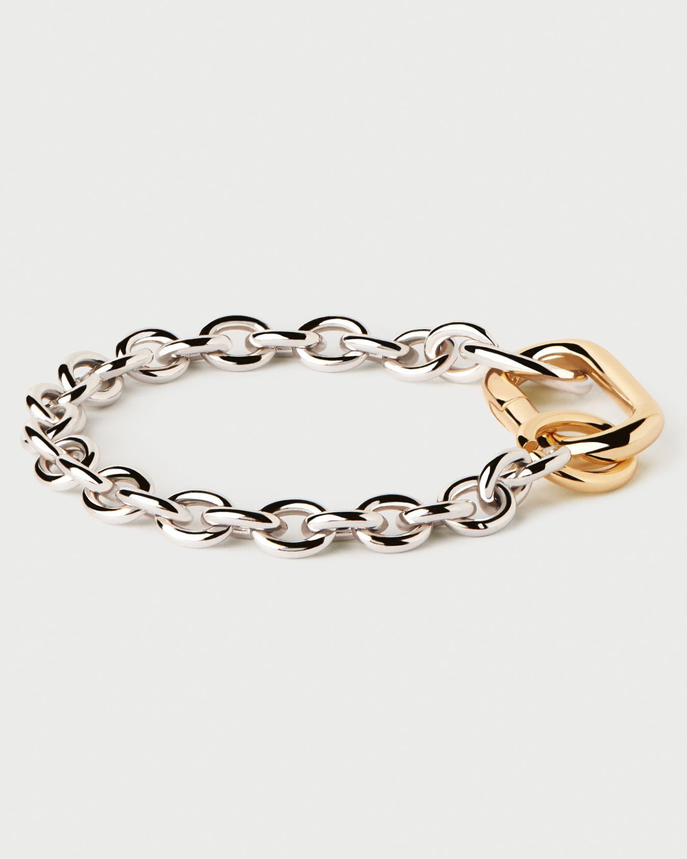 2024 Selection | Beat Chain Bracelet. Bicolor chain bracelet with silver links and bold gold-plated clasp. Get the latest arrival from PDPAOLA. Place your order safely and get this Best Seller. Free Shipping.