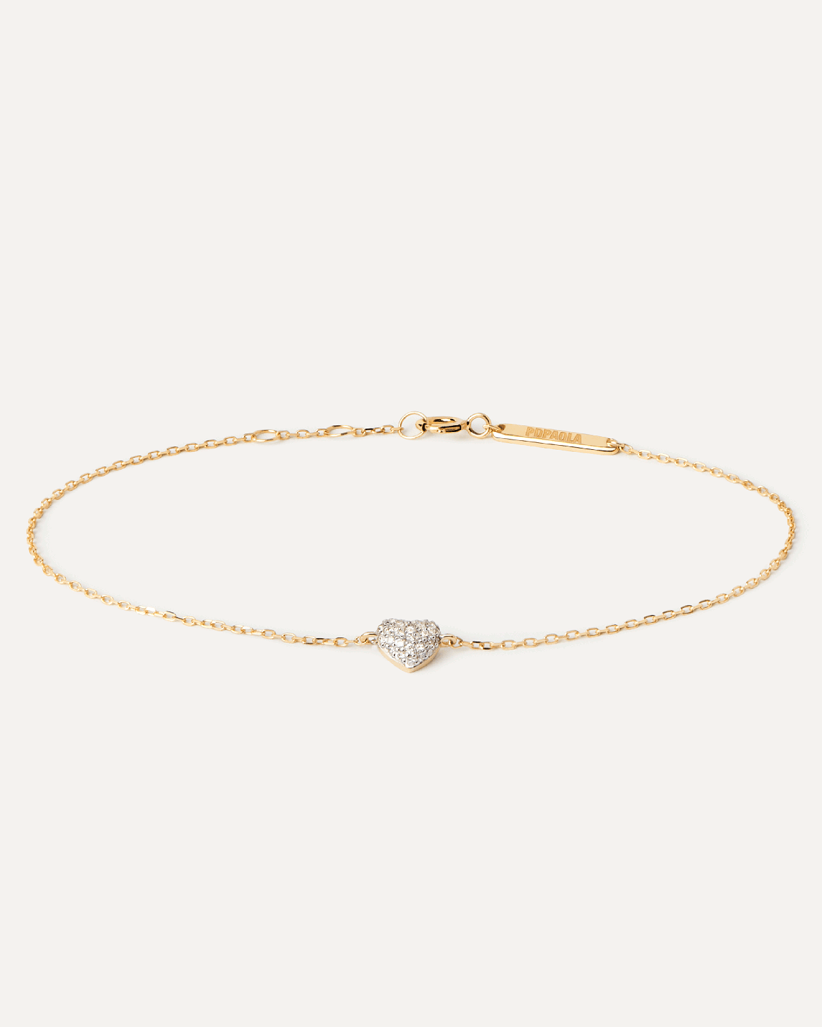 Diamonds and gold Heart bracelet. Solid yellow gold bracelet featuring a heart shape pavé lab-grown diamond of 0.11 carats. Get the latest arrival from PDPAOLA. Place your order safely and get this Best Seller.